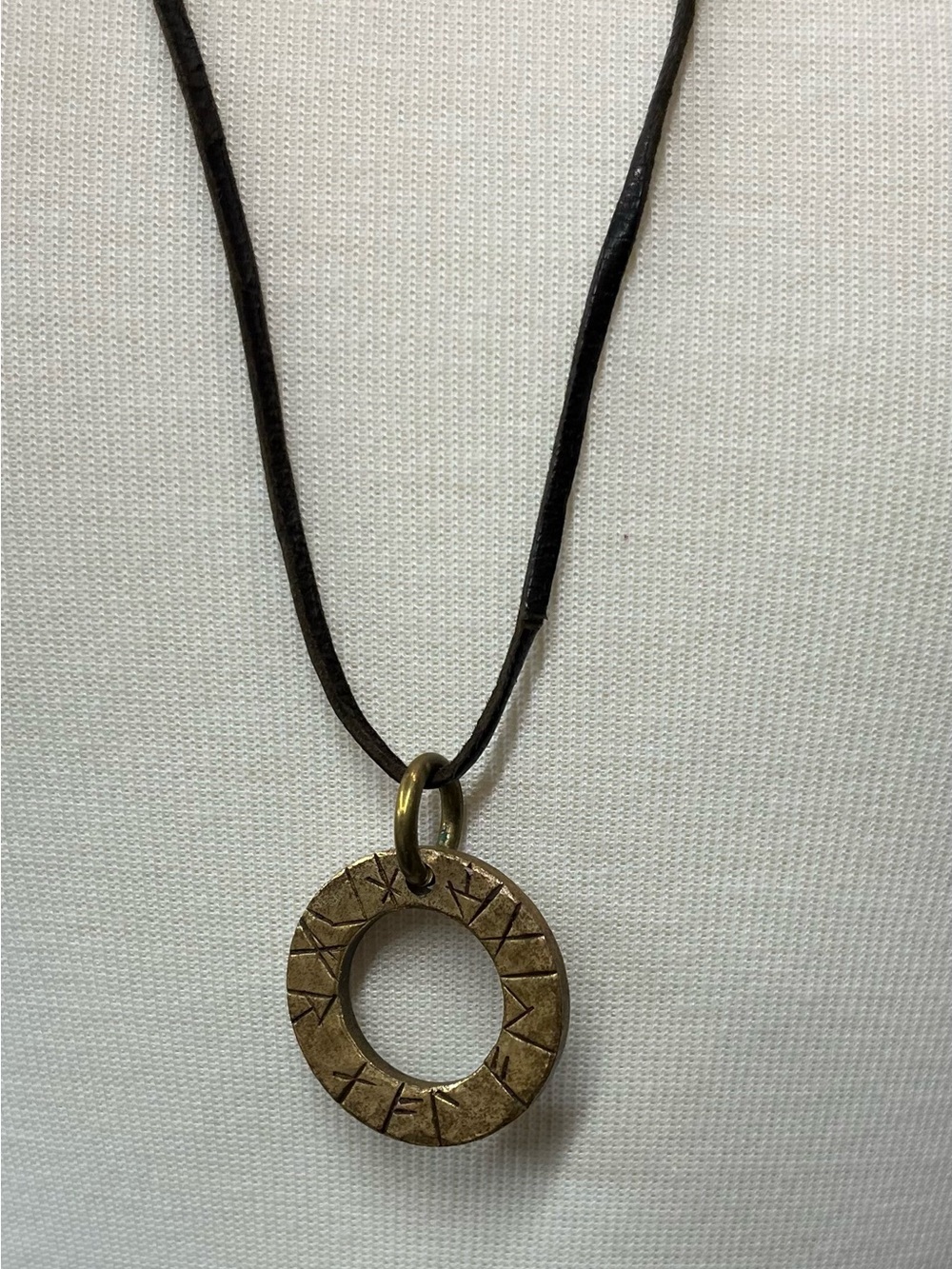 Metal disk pendant